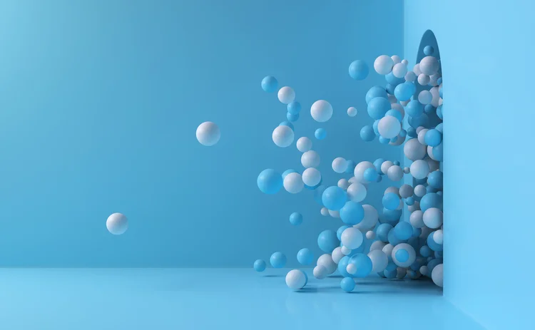 Blue and white balls bouncing into a room