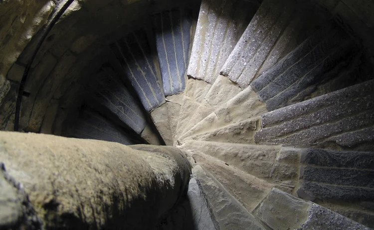 old-stone-spiral-staircase-looking-downwards