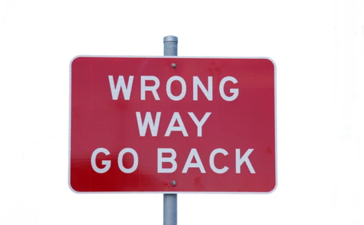 A sign reading 'Wrong way - go back'