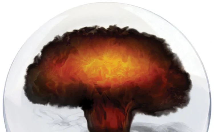 Crystal ball with nuclear bomb mushroom cloud inside