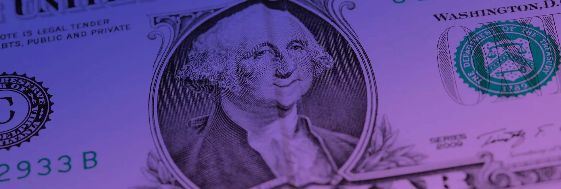 US dollar banknote with a crease down the middle giving the impression of George Washington smiling