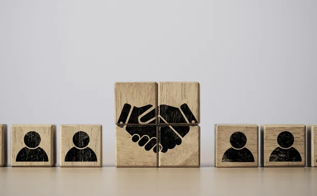 Hand shaking print screen on wooden block cube 