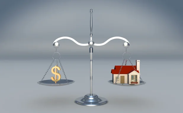 Scales with house and money