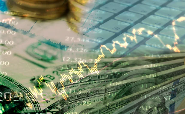 Double exposure of money and chart