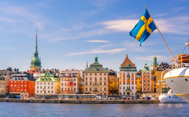 Stockholm old town and flag