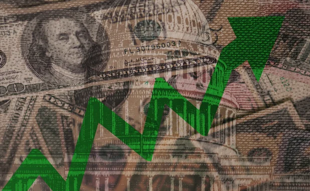 green arrow over dollars and Fed