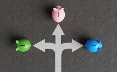 Piggy banks are shown heading in different directions