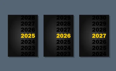 Three black-covered report booklets, with a yellow date on each: 2025, 2026 and 2027