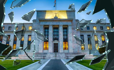 Federal Reserve building with shards of shattered glass around it