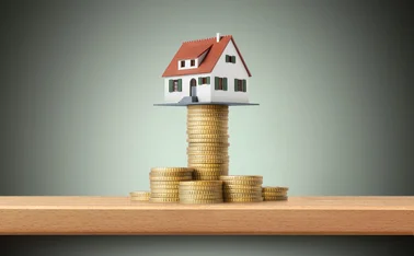 House on pile of money