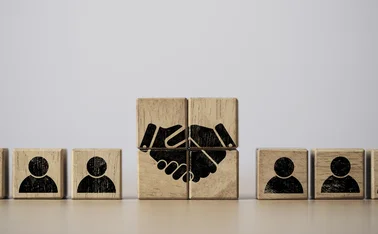 Hand shaking print screen on wooden block cube 