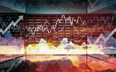 Stormy and sunny clouds overlaid with financial data charts