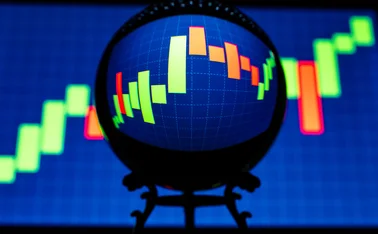 Crystall ball in front of options trading screen