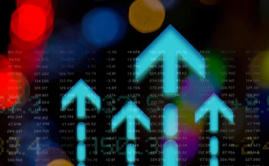 Blue upward pointing arrows with some generic data in the background