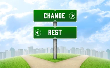 One sign points to ‘change’, the other points to ‘rest’
