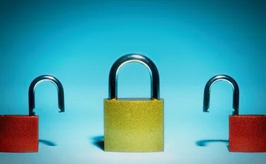 Three padlocks, one of which is locked