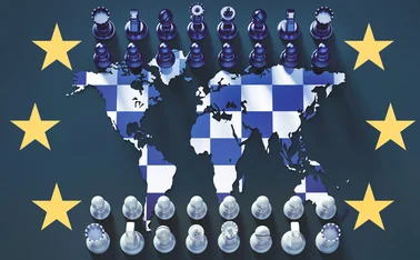Chessboard against global map surrounded by EU stars