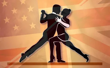 Two tango dancers with a merging of US and UK flags as a background