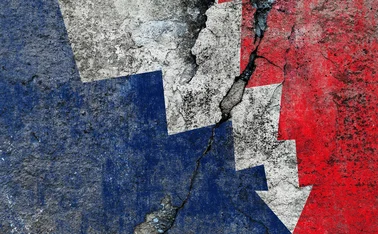 Cracked wall with France decline graffiti