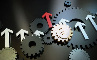 Interacting cogs with a euro currency symbol
