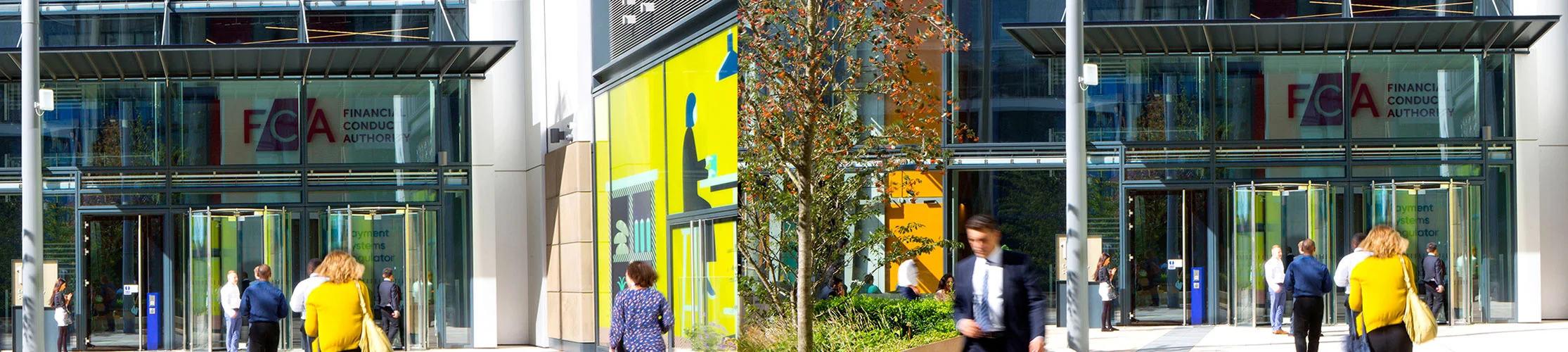 Outside of FCA offices, with the logo visible