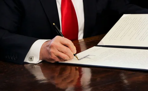 Donald Trump signing an executive order