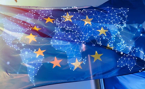 Montage of the world map as a polygon graphic overlaid on top of EU flags