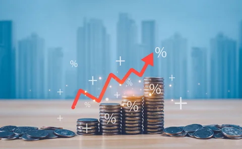 Rising pile of money with upwards arrow