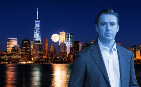 Robert DeNault, of Kalshi, in front of a perigee full moon over lower Manhattan