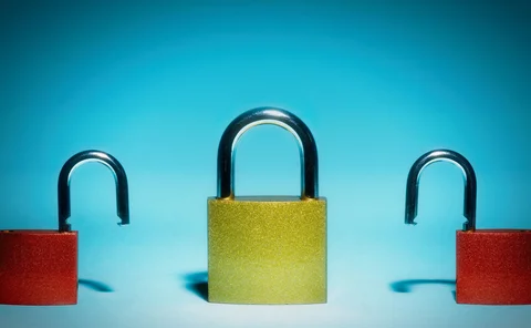 Three padlocks, one of which is locked