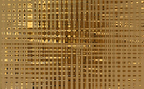 Abstract gold geometric background featuring a reflective metallic grid of rectangular shapes, modern digital pattern, luxury texture, and technology-inspired design