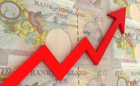 Pound notes with a red upward arrow