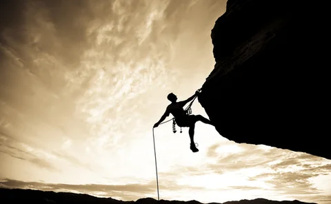 rock-climber-rappelling-6206976