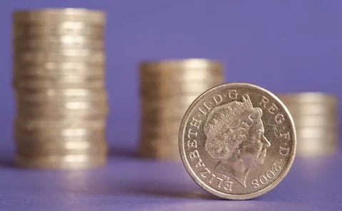 Pound coins stacked