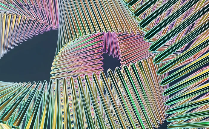 Futuristic radial data visualisation with glowing coloured segments forming spiralling patterns, symbolising big data, analytics, and digital networks.