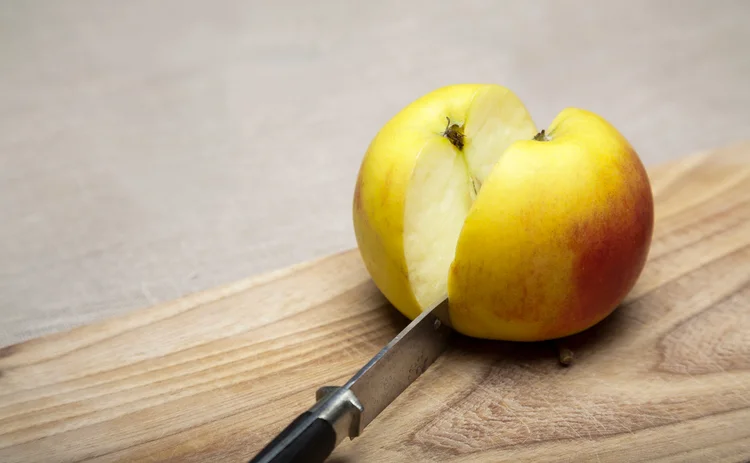cut apple - divide - Getty - web.jpg