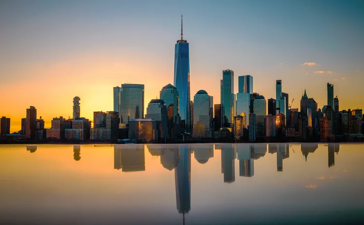 Manhattan skyline reflected in water