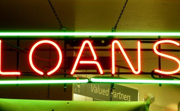 A neon sign advertising loans