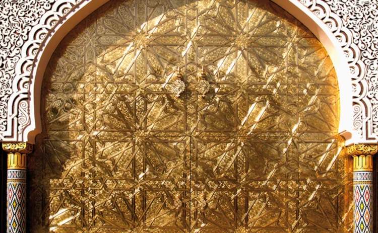 gold-islamic-door-with-white-details-and-pillars