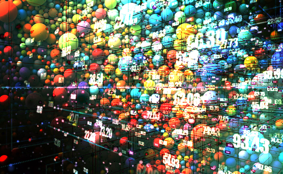 Thousands of coloured balls with an image of data overlaid