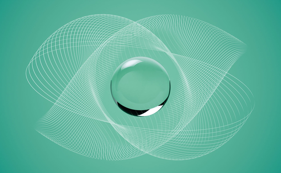 A sphere sits in the middle of some criss-crossing grids on a green background