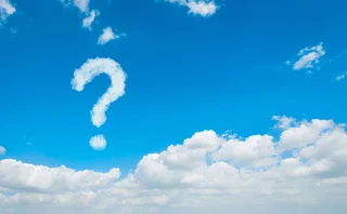 A cloud in the sky in the shape of a question mark