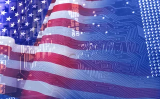 Montage of a US flag and a computer chip