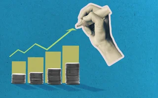 Coins and graph with hand drawing arrow going up