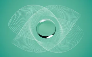 A sphere sits in the middle of some criss-crossing grids on a green background