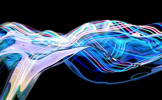 Multicoloured lines appear suspended in a liquid flow formation - abstract image