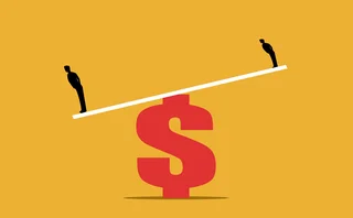 two men, either side of a seesaw, with the seesaw pivoting on a dollar sign and tipping down under the weight of the taller man