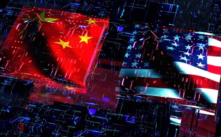 Chinese and US flags superimposed on digital background of a circuit board