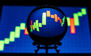 A candlestick chart viewed through a crystal ball