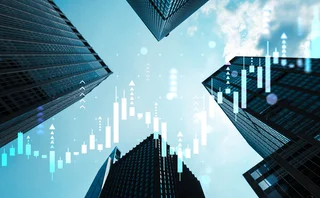 Skyscrapers and stock chart overlaid 
